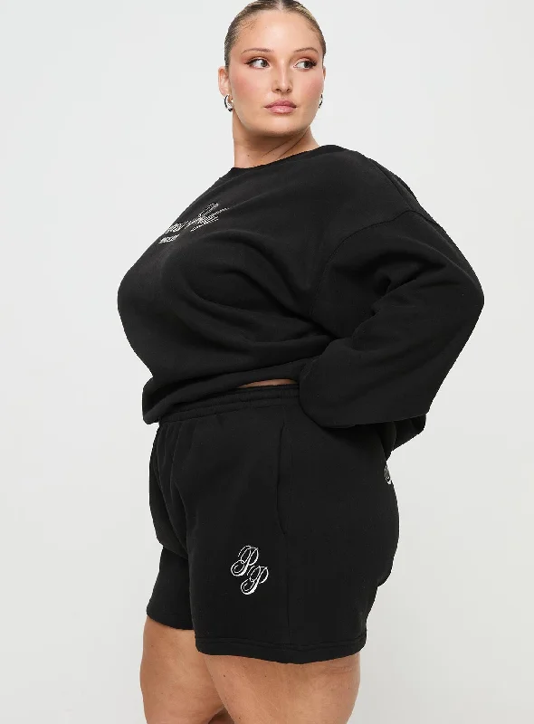 princess-polly-track-shorts-cursive-text-black-sand-curve