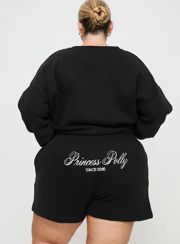 princess-polly-track-shorts-cursive-text-black-sand-curve