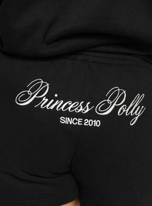 princess-polly-track-shorts-cursive-text-black-sand-curve