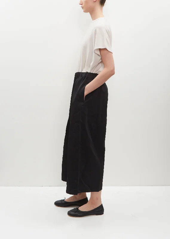 ss24ccg16-comme-des-garcons-comme-des-garcons-poly-gabardine-stripe-pants